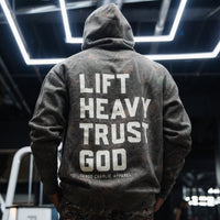 Lift Heavy. Trust God. - Premium Darkwood Camo Hoodie