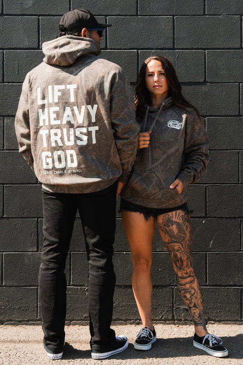 Lift Heavy. Trust God. - Premium Darkwood Camo Hoodie Hoodies military apparel sticker patch aviation funny custom usmc navy best military aviation apparel patches and motto gym workout garage flags t-shirt mens
