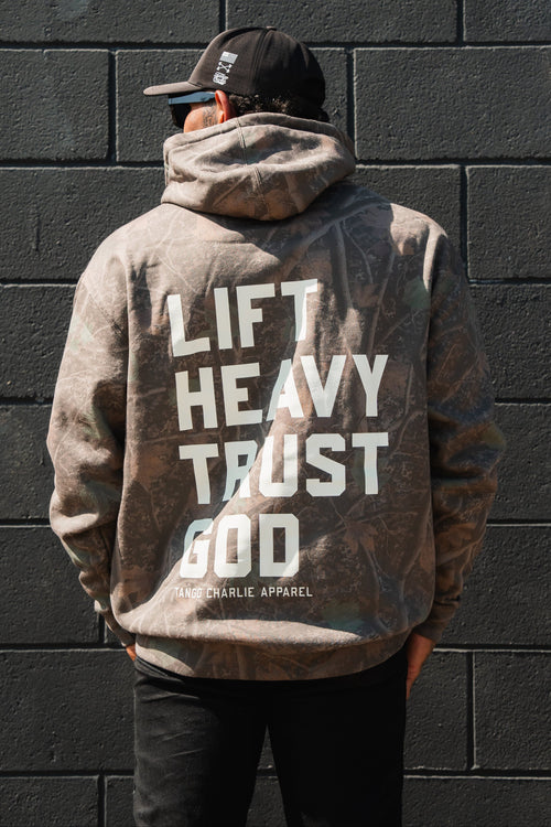 Lift Heavy. Trust God. - Premium Darkwood Camo Hoodie Hoodies military apparel sticker patch aviation funny custom usmc navy best military aviation apparel patches and motto gym workout garage flags t-shirt mens
